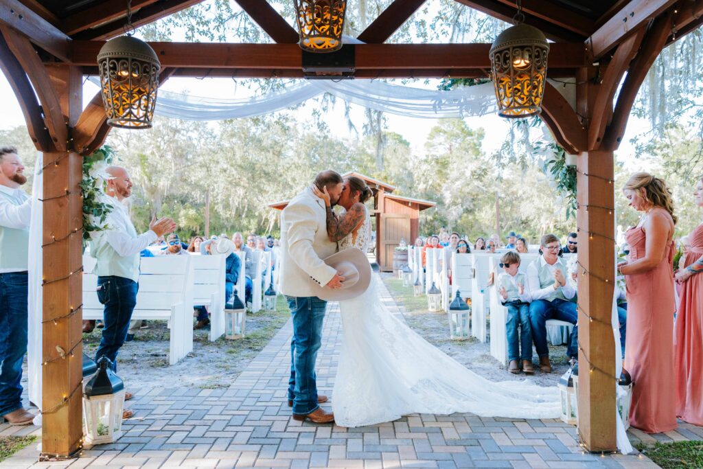 First Kiss - Ever After Farms Vineyard Barn Wedding